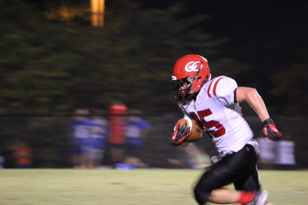 Raiders Fall In Opener
