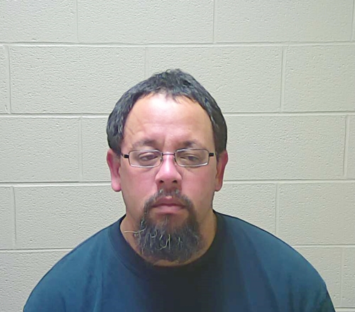 Man Charged With Passing Counterfeit Bill Wanted For Bank Robbery