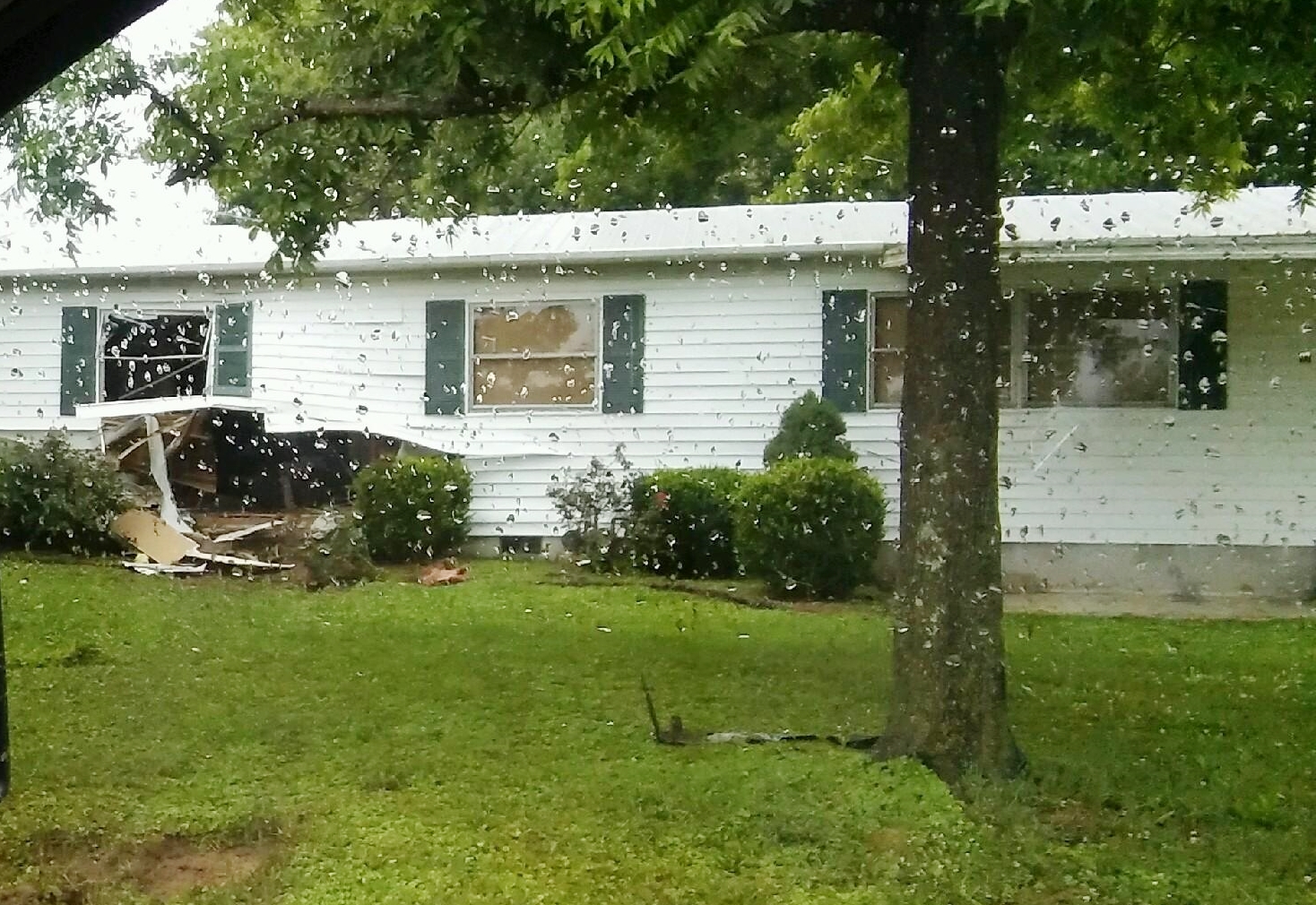 Car Crashes into Home