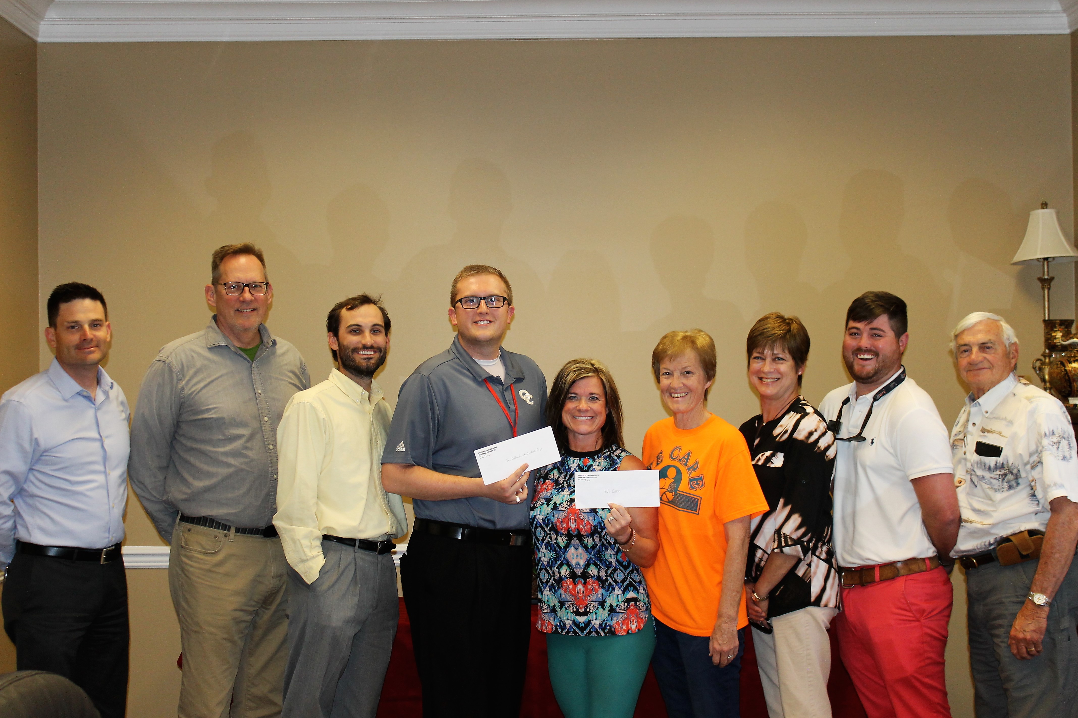 Sportsmen and Businessmen Charitable Organization Donate to Local School Systems