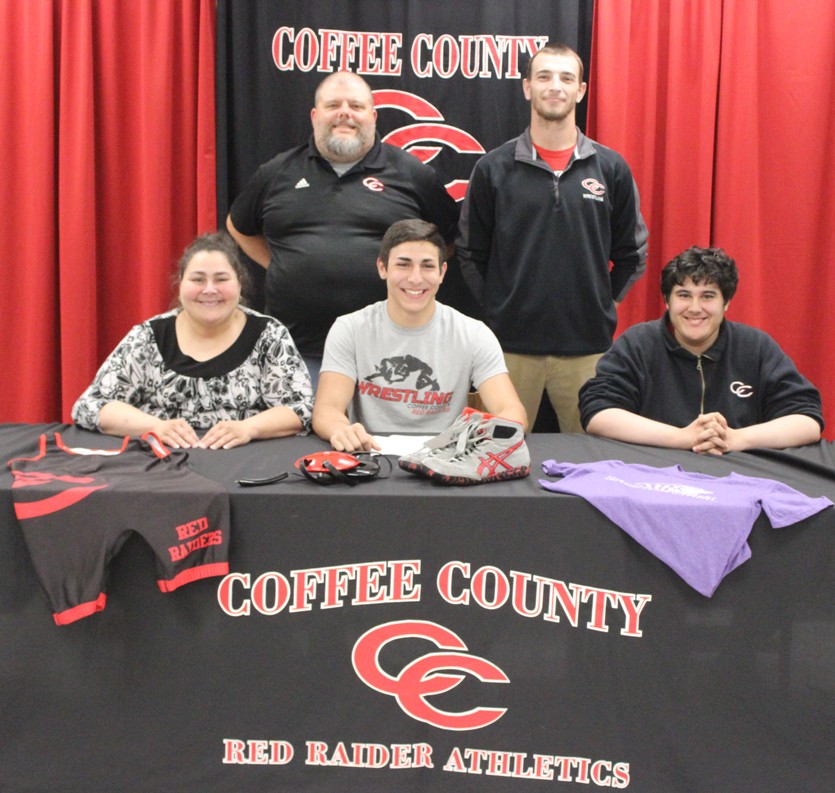 Rey Reyes Signs College Wrestling Scholarship