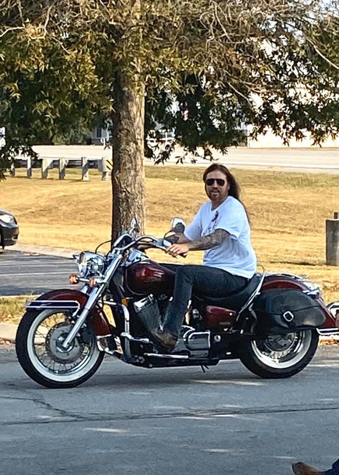 Billy Ray Cyrus plays memorial service for Channing Smith Sunday at Rotary Park