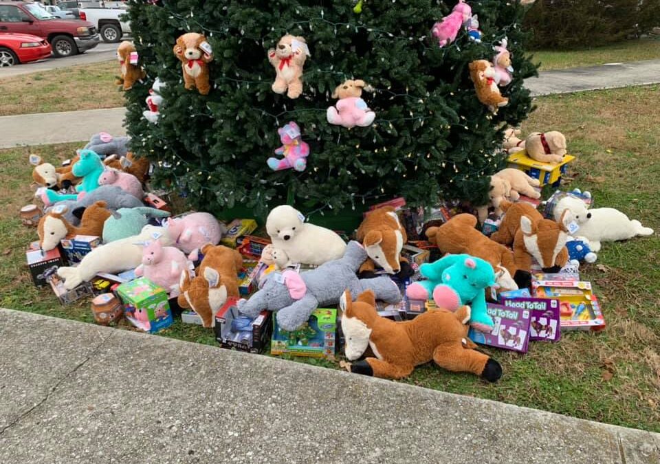 SANTA DELIVERS EARLY: Gifts under Manchester tree for those in need
