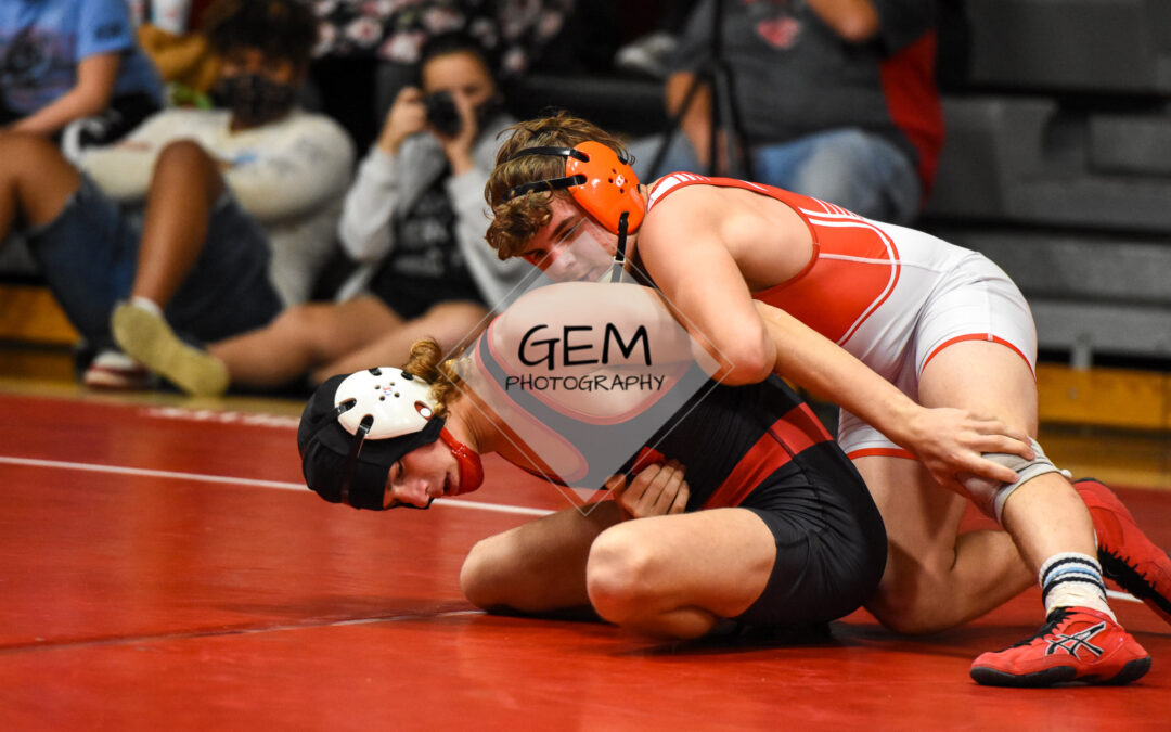 HIGH SCHOOL WRESTLING: Raiders pick up pair of region wins