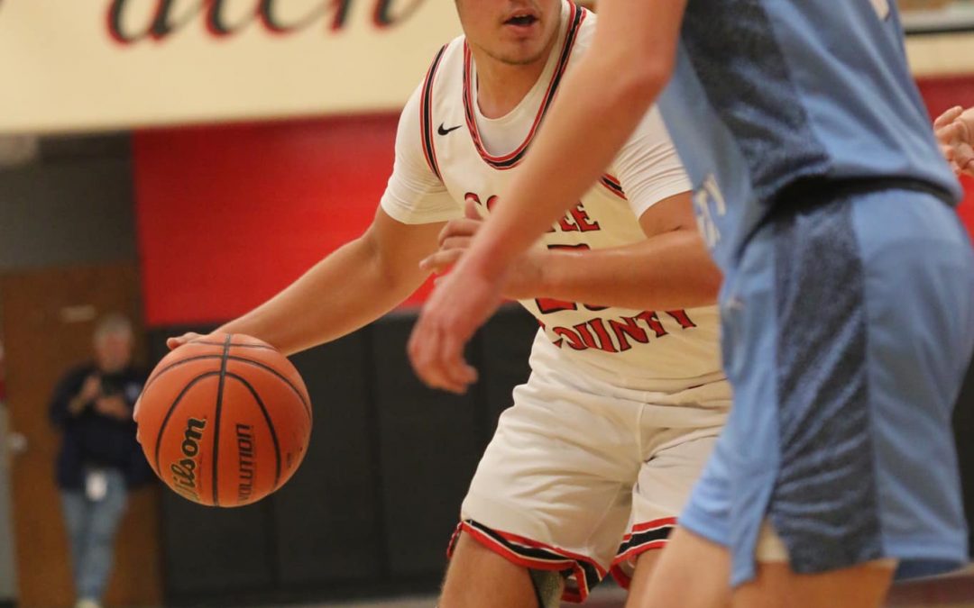 Raiders erase early deficit, drop Moore County 63-49 in season opener
