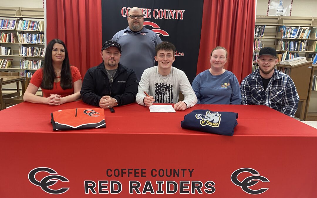 Judge signs wrestling scholarship